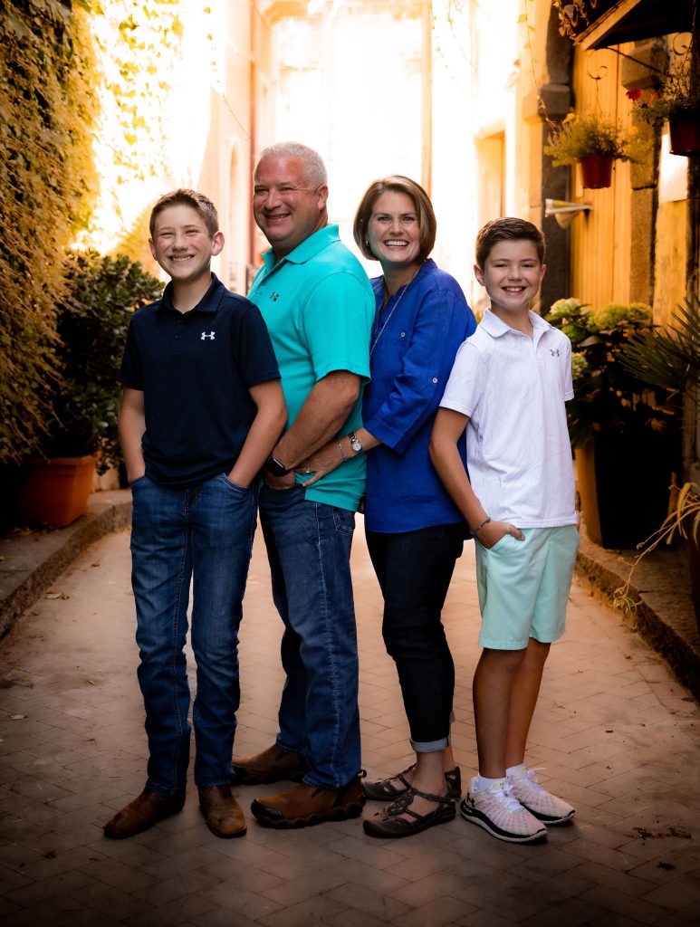 The Marshall Family posing together on a side street